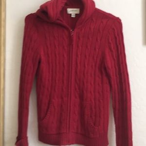 Red, zip up, cable knit hoodie.